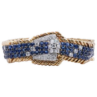 Vintage Hammerman Bros. Platinum, Sapphire and Diamond Bracelet: DESCRIPTION: A vintage Hammerman Bothers bracelet comprised of a platinum foundation featuring a buckle design at the center accented with 18k yellow gold bordering, further decorated throughout with