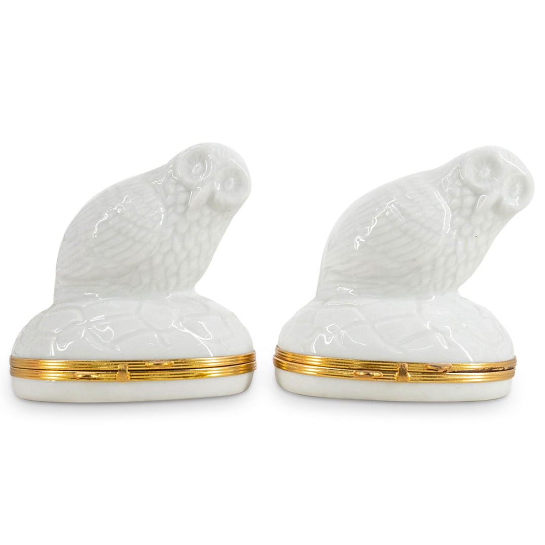 Pair of Limoges Porcelain Trinket Box: DESCRIPTION: A Limoges porcelain trinket box features an all white foundation decorated with an owl motif and brass hardware. Marked along the interior" Limoges France". CIRCA: 20th Century ORIGIN: Fr