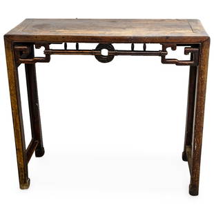 Antique Chinese Carved Wood Medallion Altar Table: DESCRIPTION: Antique carved wood altar table featuring an open-work skirt carved with a coin design bearing auspicious symbols. CIRCA: Early to mid-20th Century ORIGIN: China DIMENSIONS: H: 33.5" W: 1