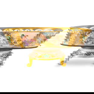 Antique Royal Vienna Porcelain Centerpiece: DESCRIPTION: Antique Royal Vienna porcelain centerpiece featuring a removable bowl atop a matching four legged base. Bowl features neo-classical imagery of puttos and goddesses and both pieces are fin