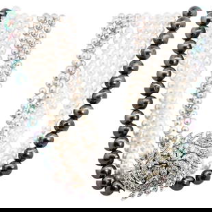 Vintage 14k Gold, Diamond and Multicolored Pearl Beaded Necklace: DESCRIPTION: A vintage pearl beaded necklace features (8) strands decorated with white, black and grey beaded pearls. The strands are joined at the center with an elegant 14k white gold closure pendan