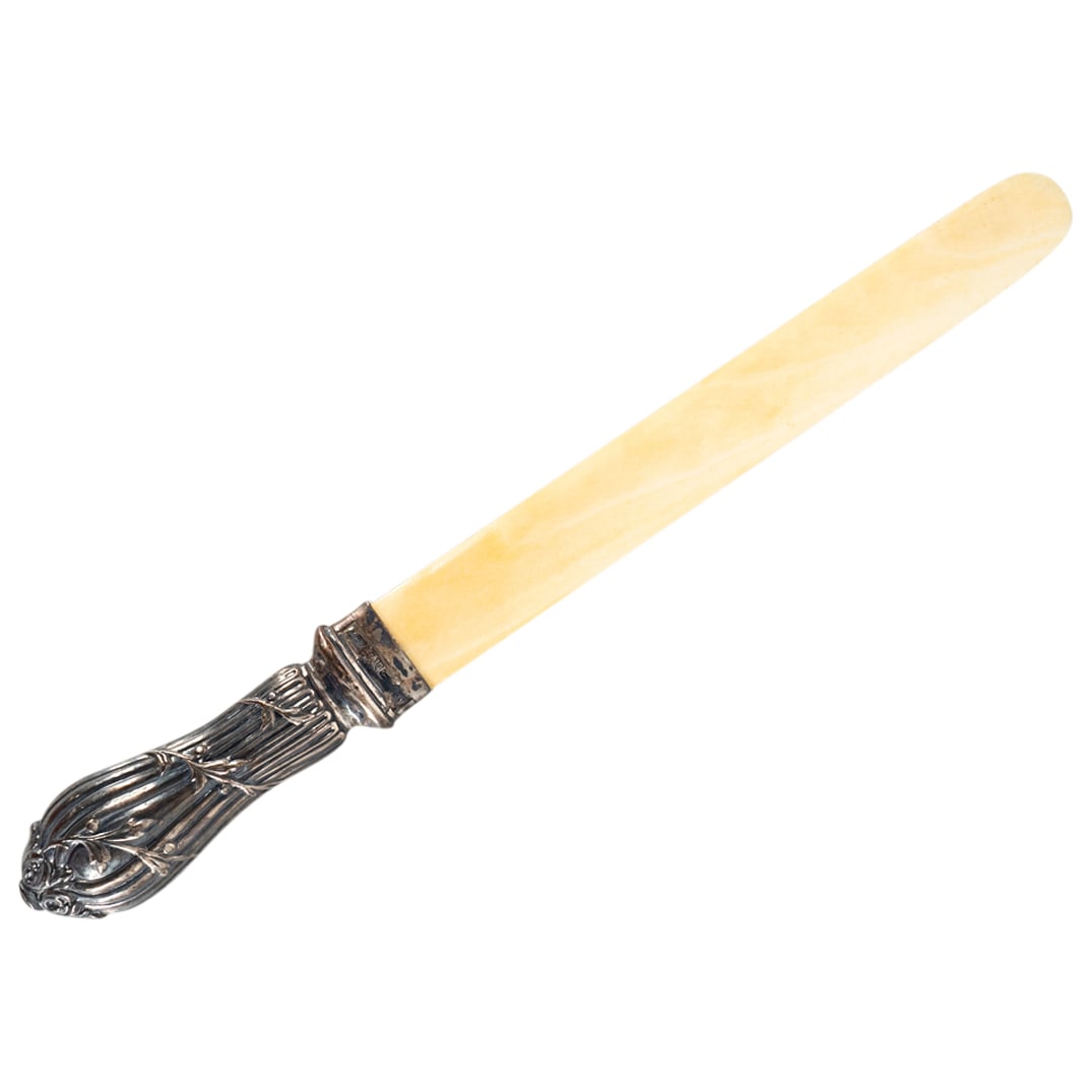 Antique English Bone And Sterling Silver Page Turner: DESCRIPTION: Antique carved page turner featuring a sterling silver handle fashioned as foliage wrapped in a berry-laden vine. Hallmarked illegibly on handle; possibly crafted by Emmanuel Levy. Total 