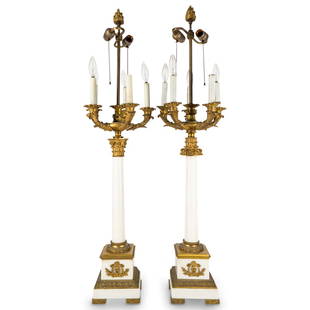 Pair Antique French Empire Style Candelabra Lamps: DESCRIPTION: Pair of antique marble and gilt mixed metal French Empire-style candelabra lamps, each featuring a white marble column capped by a Corinthian capital, five acanthus arms leading into ligh