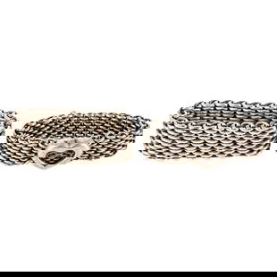 (2 Pc) Tiffany & Co. "Somerset" Sterling Silver Mesh Rings: DESCRIPTION: Two Tiffany & Co. sterling silver items: (1) Tiffany & Co. "Somerset" sterling silver mesh ring. Hallmarked with "Tiffany & Co. 925" at interior. Ring size: 8 (1) Tiffany & Co. "Somerset"