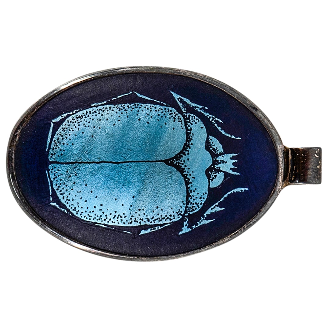 Vintage Orient & Flume Art Glass Scarab Pendant W/ Sterling Mount: DESCRIPTION: Vintage Orient & Flume art glass scarab pendant in sterling silver mount. Engraved on reverse of mount: "Orient & Flume 83-1978". Impressed on reverse of mount: "Sterling". Includes Orien