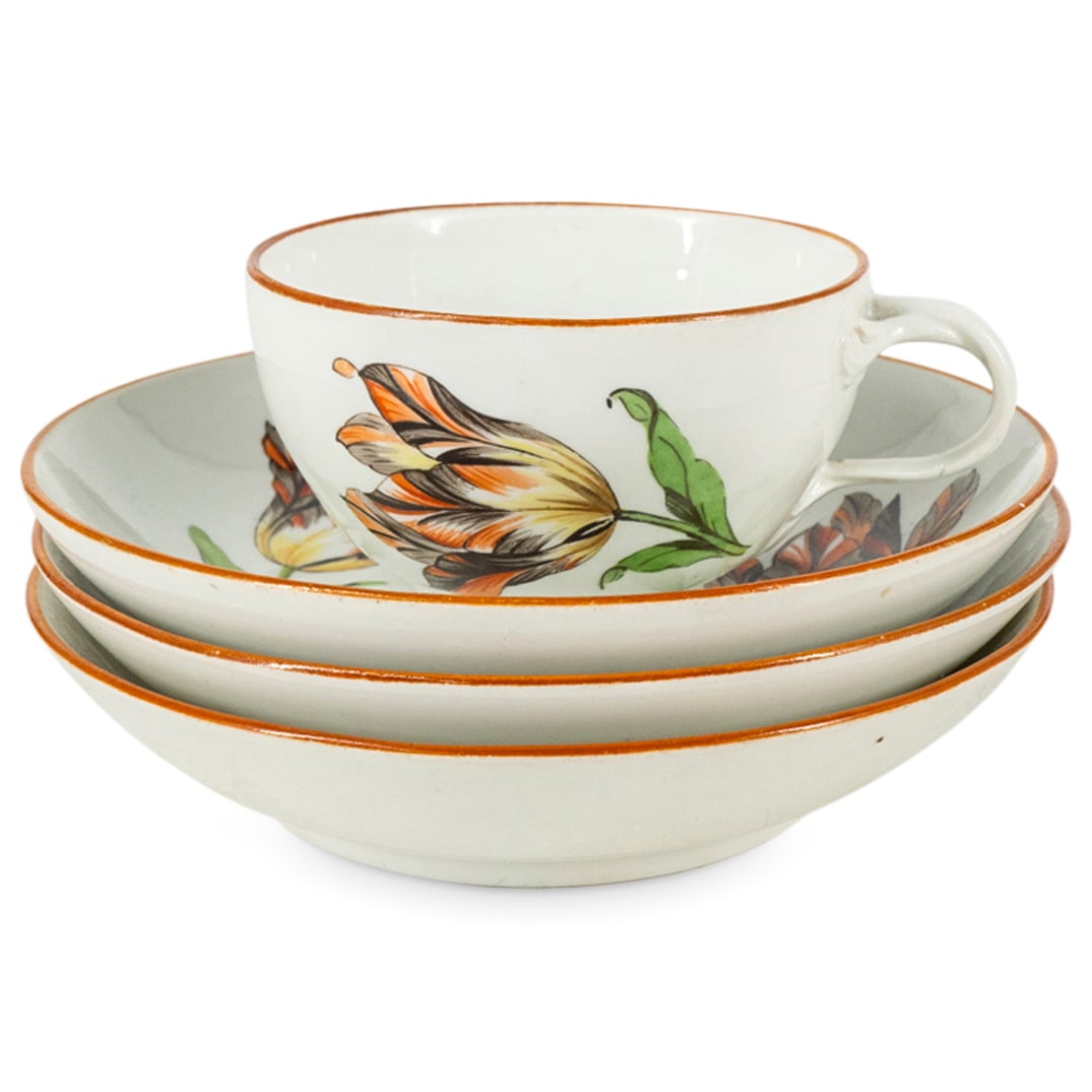 (4 Pc) Antique Meissen Teacup And Saucers: DESCRIPTION: Four porcelain Meissen dishes-one teacup and three saucers-each featuring a floral motif against a white background. Hallmarked on underside with 1774 crossed swords and asterisk mark. CI