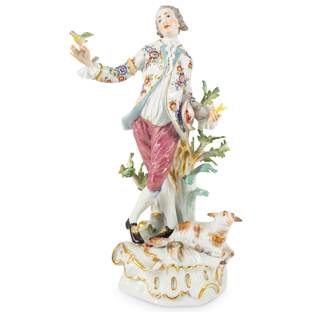 Antique Meissen Porcelain Youth W/ Bird And Lamb: DESCRIPTION: Antique Meissen porcelain sculpture depicting a youth standing against a foliage laden tree adjacent to a lamb while holding a bird in his right hand and wheat in his left. Hallmarked on 