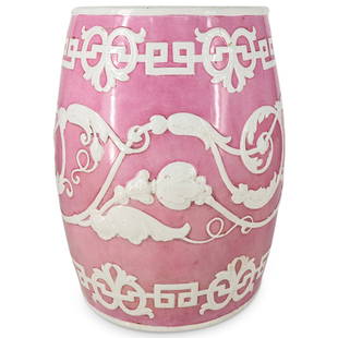 Antique French Chinoiserie Drum Form Garden Stool: DESCRIPTION: Antique chinoiserie garden stool fashioned in the Chinese drum form, glazed in pink and white, and finished with a winding vine design on the body and three pierced holes in the seat. CIR