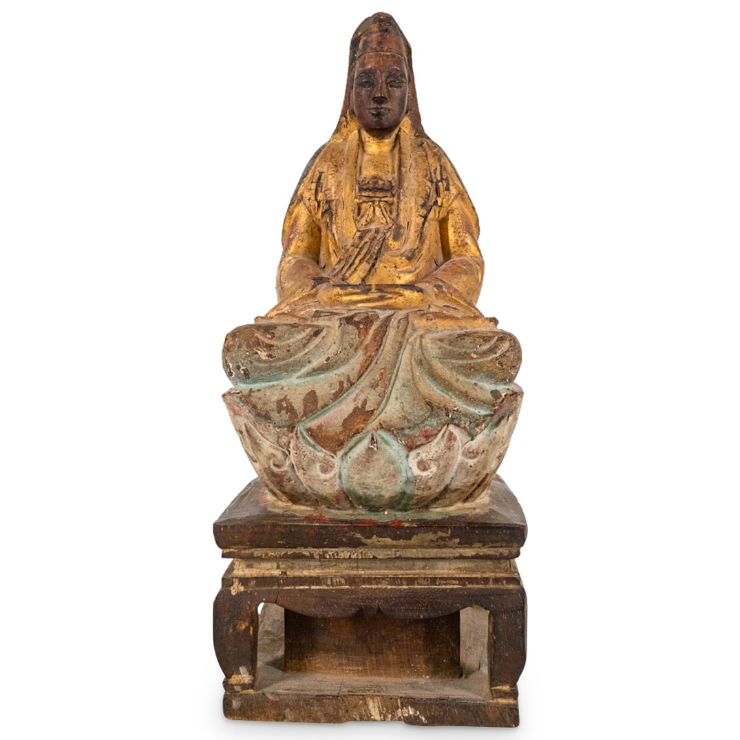 Antique Chinese Carved Wood Guanyin Sculpture: DESCRIPTION: Antique Chinese polychrome carved wooden sculpture depicting Guanyin seated atop a lotus throne. CIRCA: Early 20th Century ORIGIN: Chinese DIMENSIONS: H: 12.5" W: 4.25" L: 5" - CONDITION: