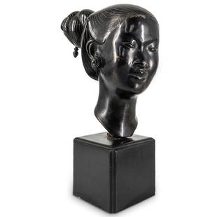 Gia Loi (Vietnamese) Bronze Bust Of Woman: DESCRIPTION: Bronze sculpture by Gia Loi (Vietnamese) depicting a woman. Atop a lacquered wooden base. Marked on verso. CIRCA: 20th Century ORIGIN: Vietnamese DIMENSIONS: H: 13" W: 5.5" L: 7.5" - COND