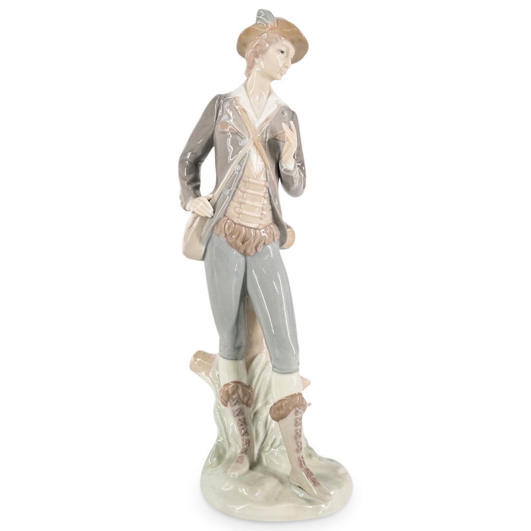 Lladro Porcelain "Country Man" Figurine: DESCRIPTION: Lladro glazed porcelain figurine titled "Country Man". Model number: #4664. Marked with Lladro hallmark on the underside. CIRCA: 20th Century ORIGIN: Spain DIMENSIONS: H: 11 3/4" W: 4" CO