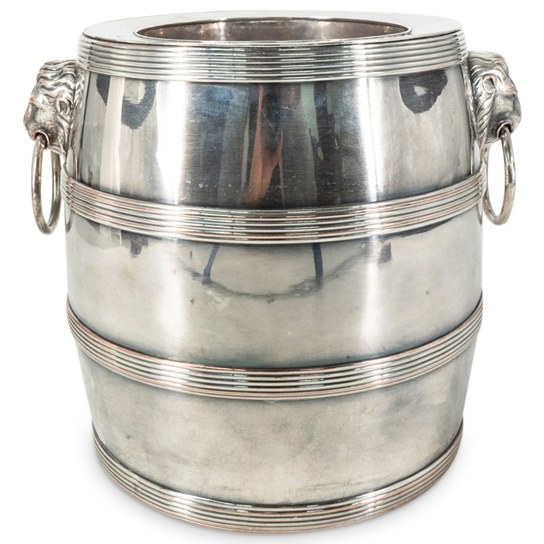 English Silver Plated Wine Cooler: DESCRIPTION: An English silver plated wine cooling bucket with double lion mask handles. CIRCA: Early to Mid 20th Century ORIGIN: England DIMENSIONS: H: 7.5" x D: 9" - CONDITION: Great condition. See 