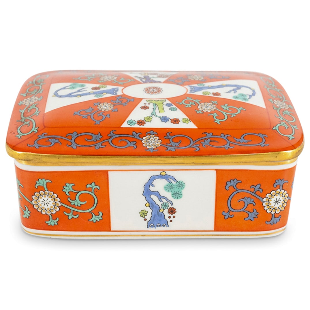 Herend Porcelain Cigarette Box W/ Lid: DESCRIPTION: Herend porcelain Cigarette Box with Lid. Finished with gilded accents. Style:#7971. Marked along the underside with Herend stamps. CIRCA: 20th Century ORIGIN: Hungary DIMENSIONS: H: 2 1/4