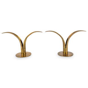 (2 Pc) Swedish Mid Century Ystad Brass Lily Candlestick Holders: DESCRIPTION: (2 Pc) Vintage Swedish Mid Century Ystad Brass Lily Candlestick Holders by Ivar Alenius Bjork. Marked on the underside Bottom stamped â€œYstad Metall Made in Sweden IAB&rdquo;. Ivar A