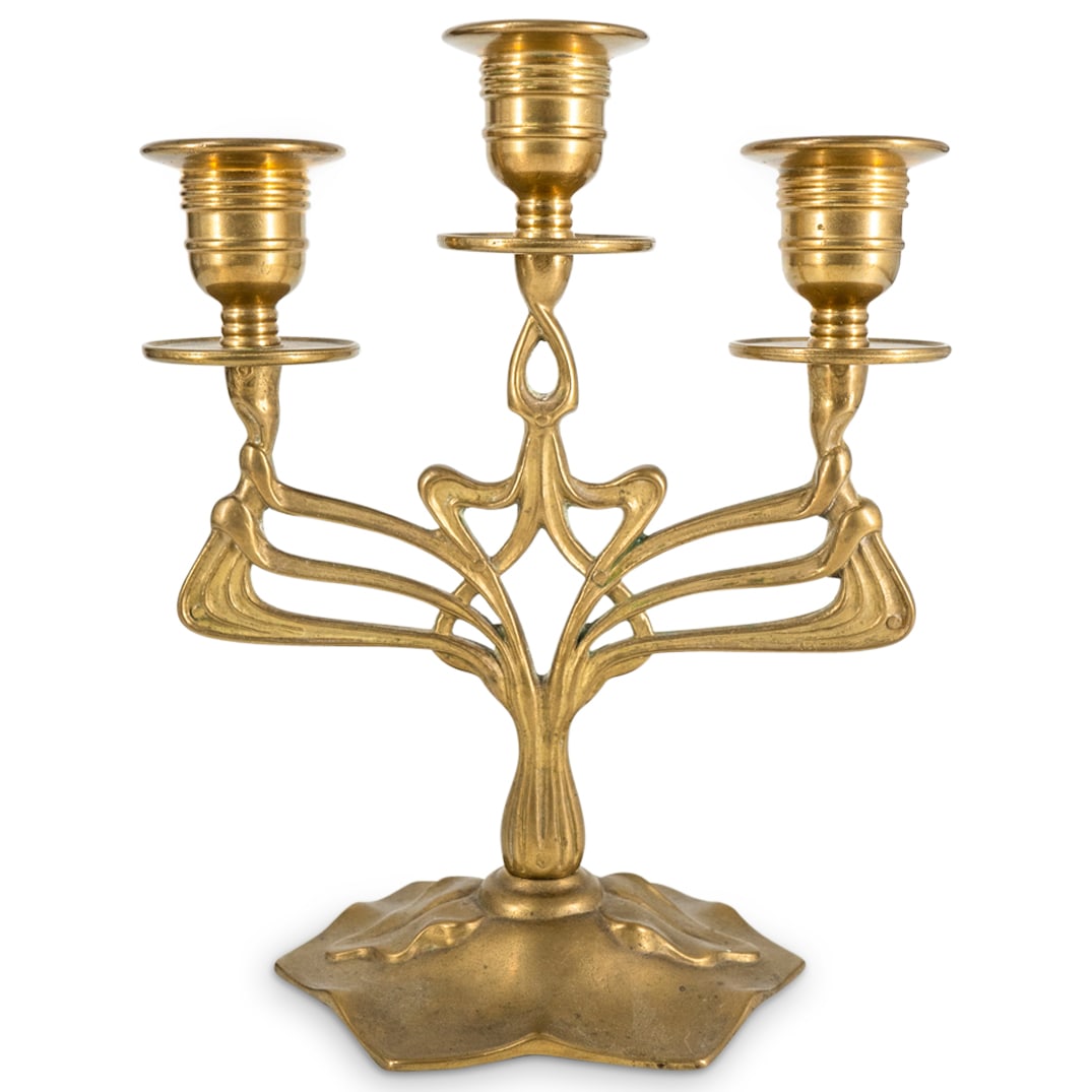 Art Nouveau Bronze Candelabra: DESCRIPTION: Art Nouveau bronze candelabrum featuring three sockets atop an open-work, foliage form stem. CIRCA: Late 19th to early 20th Century ORIGIN: France DIMENSIONS: H: 9" W: 3.5" L: 7.25" CONDI