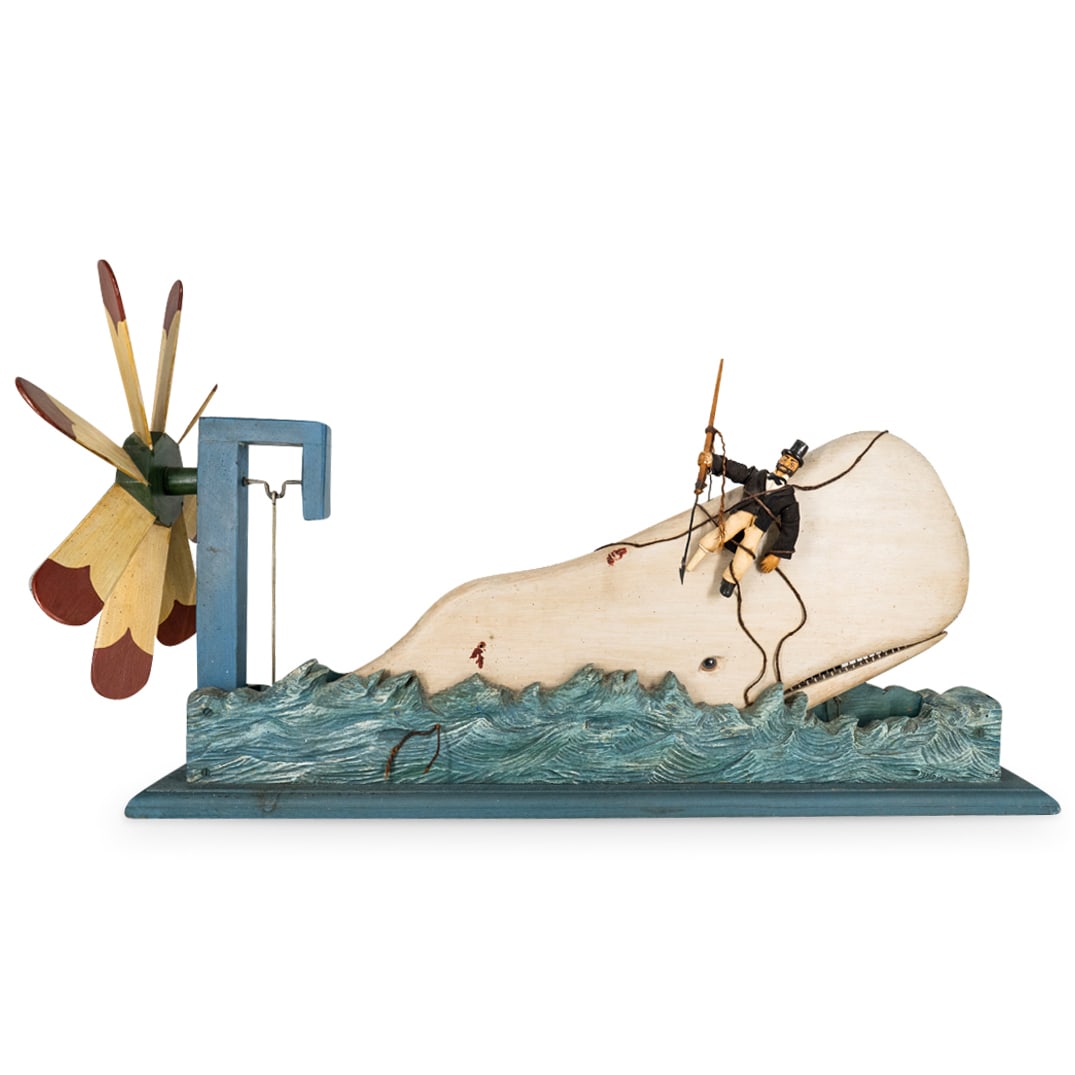 Vintage Stephen Ketchum Moby Dick Whirligig: DESCRIPTION: Carved wood whirligig by Stephen Ketchum depicting Captain Ahab wrapped to Moby Dick among crashing waves. Piece has a large turbine at verso which moves Moby's mouth and Ahab's right arm