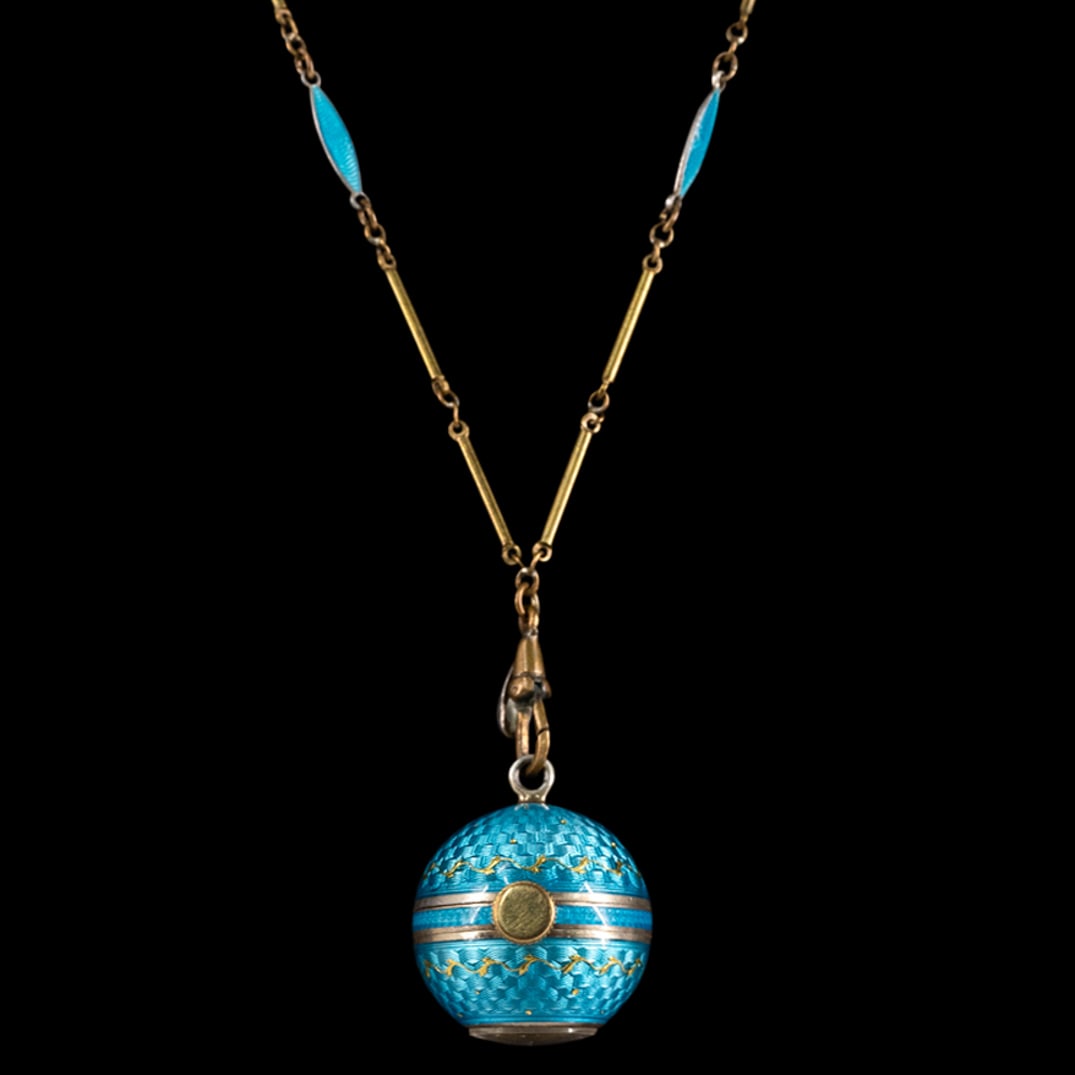 Bucherer 17 Jewel Enamel Sterling Silver Watch Pendant W/ Chain: DESCRIPTION: Vintage Swiss Made Bucherer enamel sterling silver ball pendant watch with gold filled link chain. CIRCA: 20th Century ORIGIN: Switzerland DIMENSIONS: Pendant: 3/4" ; Necklace: 15 3/4" CO