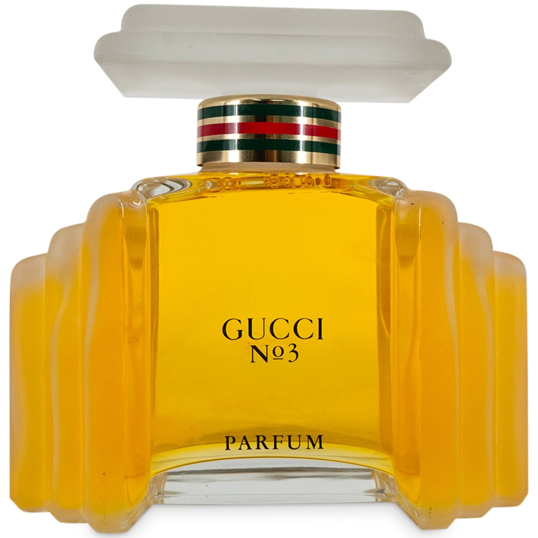 Large Gucci N.3 Display Factice Perfume Bottle: DESCRIPTION: A vintage large display Gucci N.3 factice dummy perfume bottle. CIRCA: 20th Century ORIGIN: DIMENSIONS: H: 8 1/4" W: 8 1/4" CONDITION: This is a display bottle. Does not contain perfume.
