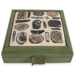 Rena Rosenthal Ceramic & Wood Box: DESCRIPTION: A Rena Rosenthal keepsake box composed of leather-wrapped wood foundation and ceramic figural intaglio inset tile. Labled: "Rena Rosenthal, New York" CIRCA: 20th Cent. ORIGIN: New York DI