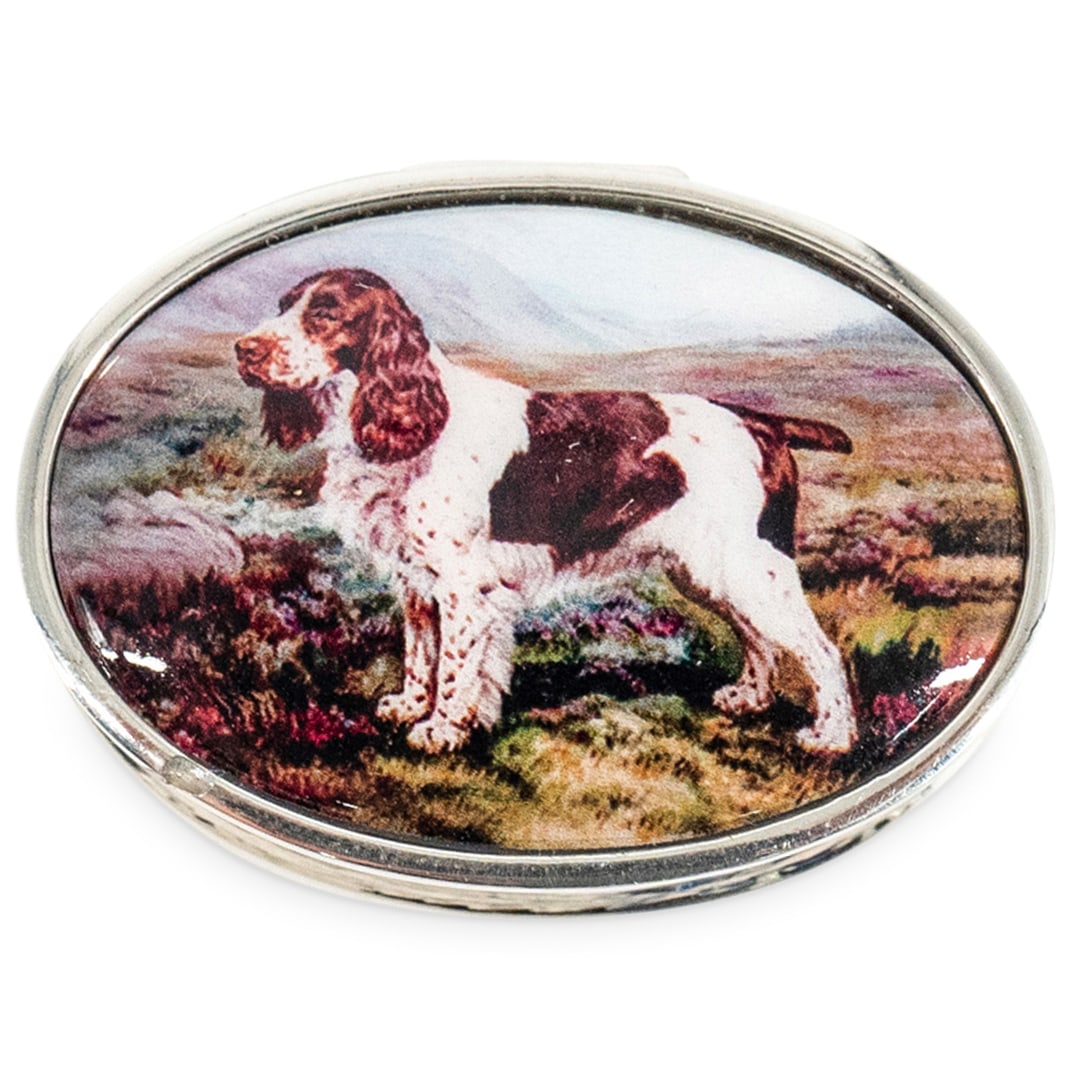 Sterling Silver "Hound Dog" Enameled Pill Box: DESCRIPTION: A sterling silver pill box adorned with enamel scenes of a hound dog, marked along the interior "Sterling". Total Weight: 20 Grams CIRCA: 21st Century ORIGIN: USA DIMENSIONS: W: 1 1/2" D: