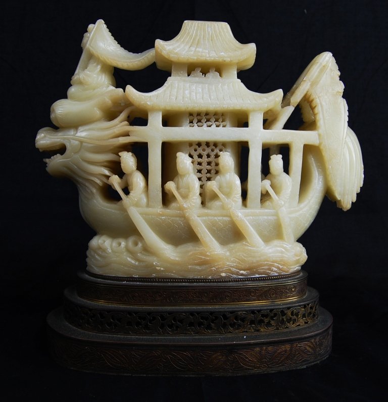 Antique Chinese carved soap stone figural lamp: DESCRIPTION: Antique Chinese carved white soap stone figural lamp, very detailed. On a brass base. Minor chips on the top. CIRCA: 19/20th ct MADE IN: China DIMENSIONS: H:10.5" L:9.5"