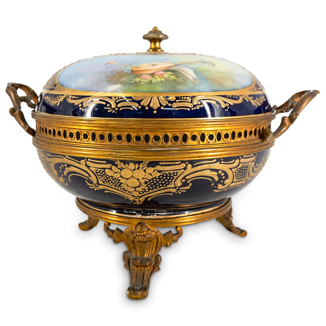 Antique Sevres Porcelain Potpourri Urn: DESCRIPTION: Antique Sevres porcelain potpourri urn featuring hand painted reserves of courting lovers and musical instruments. "Collot" at bottom right of scene of courting lovers. Completed with gil