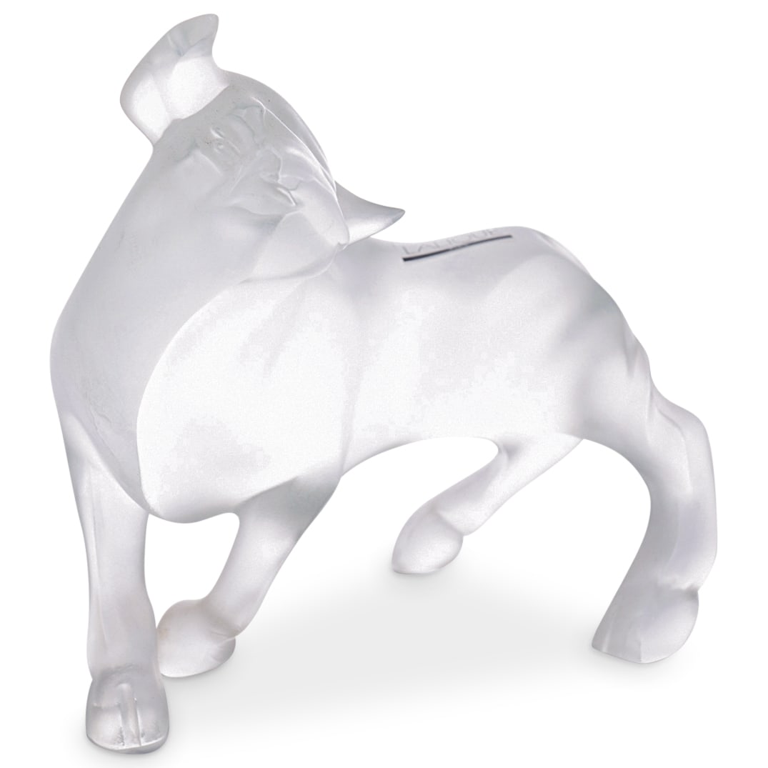 Lalique "Taureau Vuelta" Frosted Crystal Sculpture: DESCRIPTION: Lalique "Taureau Vuelta" frosted crystal sculpture depicting a bull. "Lalique France" on underside. "Lalique Paris" sticker attached. CIRCA: Late 20th - Early 21st Century ORIGIN: French 