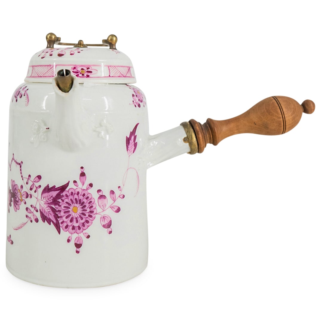 Antique Meissen Porcelain Side Handle Teapot: DESCRIPTION: Antique Meissen porcelain teapot featuring a turned wood side handle and pink floral motifs. Marked with crossed swords on underside. CIRCA: Mid-19th Century ORIGIN: Germany DIMENSIONS: H