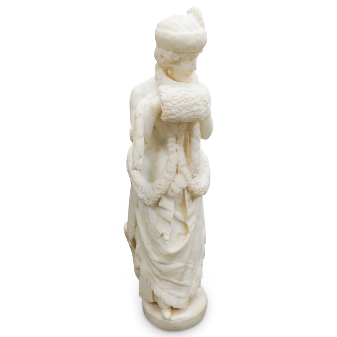 Signed Italian Carved White Marble Victorian Sculpture: DESCRIPTION: An Italian carved sculpture comprised of white marble depicting a elegant lady dressed in victorian garb. Signed along the back "Pini" and "Carrera". CIRCA: Early 20th Cent. ORIGIN: Italy