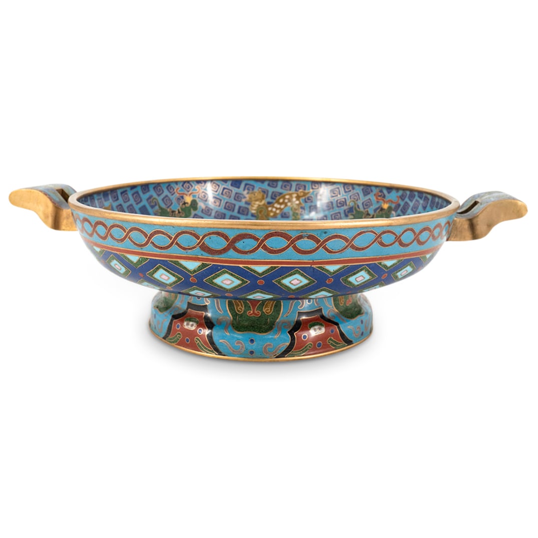 Antique Chinese Cloisonne Centerpiece Bowl: DESCRIPTION: Antique Chinese cloisonne centerpiece bowl decorated with fish, mythological creatures and geometric motifs. Completed with gilt accents, CIRCA: Late 19th - Early 20th Century ORIGIN: Chi