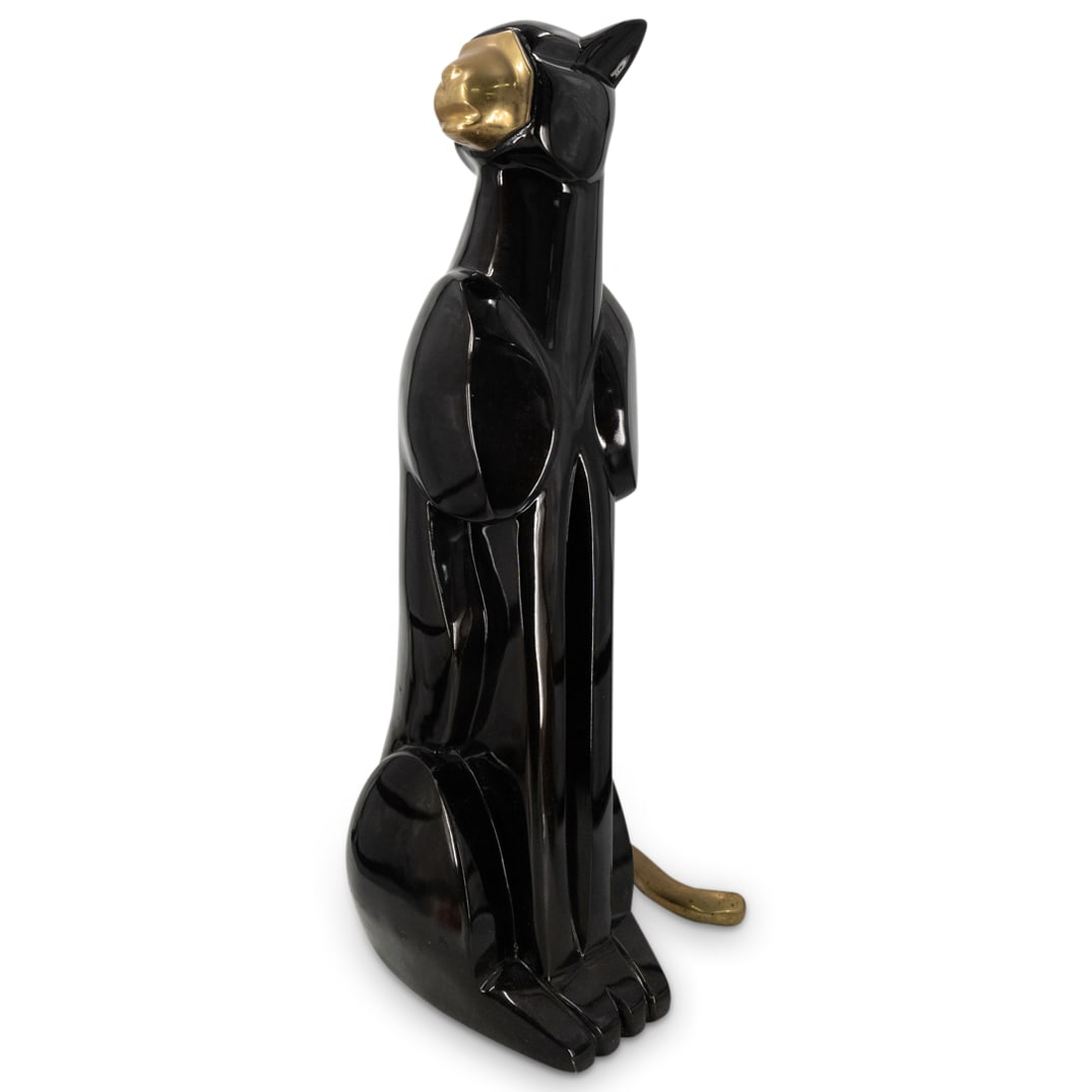 In Style Of Loet Vanderveen Panther: DESCRIPTION: Modern fiberglass panther sculpture in the style of Loet Vanderveen featuring a glossy black, minimalist, faceted body and a gilt brass snout and tail. CIRCA: 20th Century ORIGIN: Contine