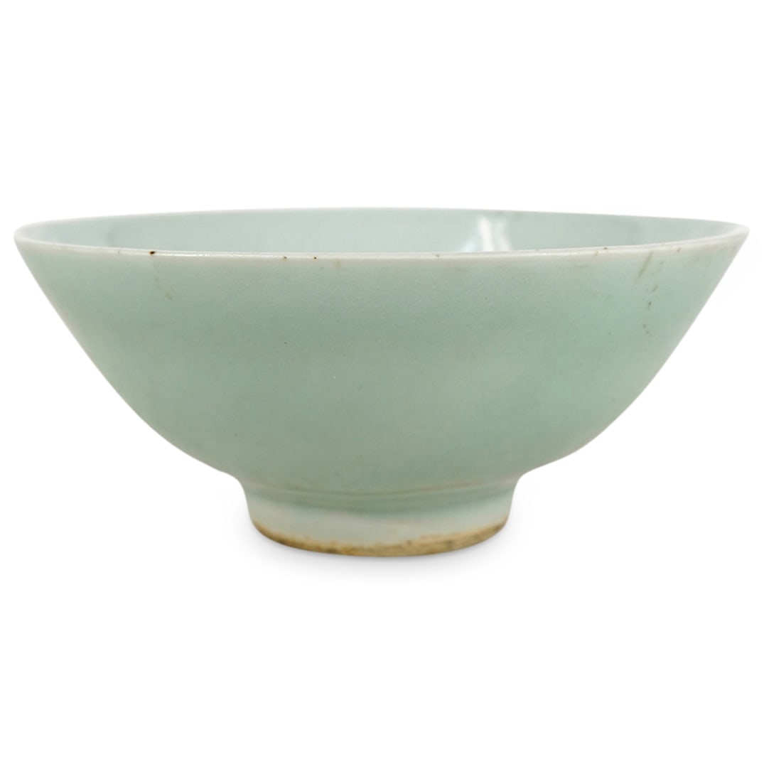 Antique Chinese Celadon Glazed Porcelain Bowl: DESCRIPTION: Antique porcelain bowl coated in a celadon glaze and marked "CHINA" on underside. CIRCA: Early to mid-20th Century ORIGIN: China DIMENSIONS: H: 2.25" D: 5.5" CONDITION: Great condition