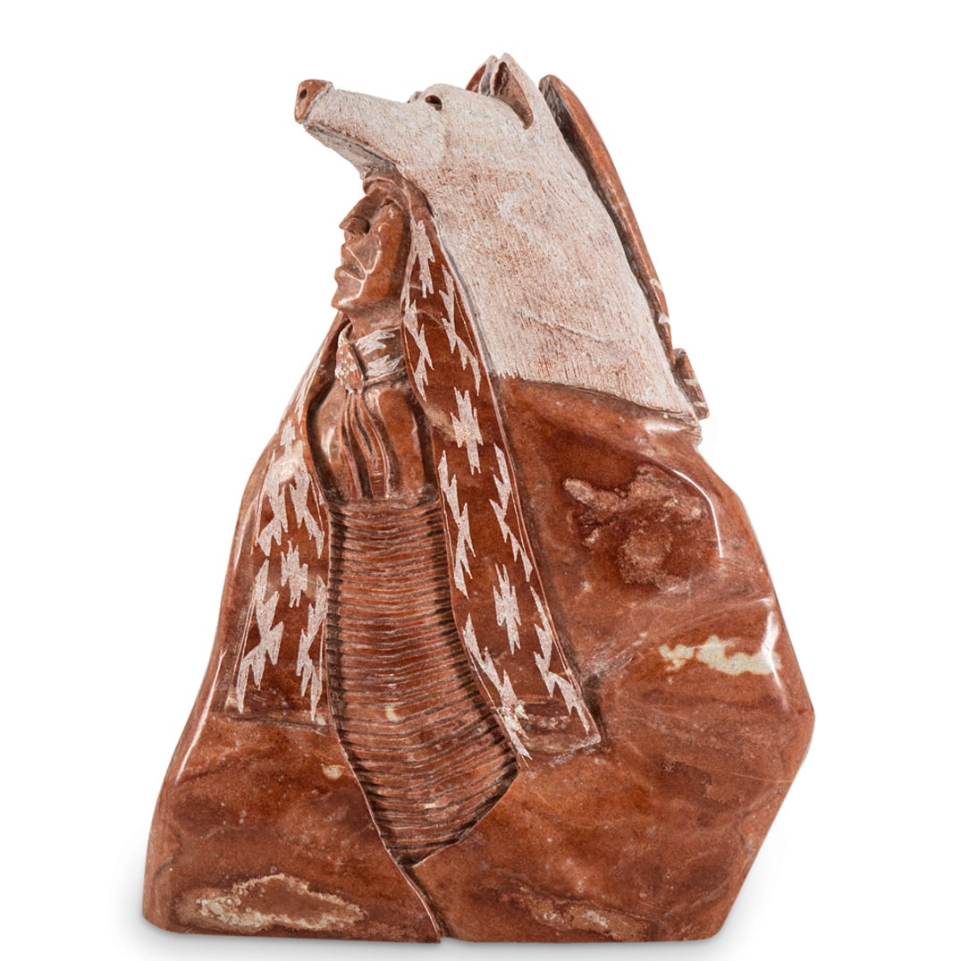 Native American Norman Lewis (American, 1909) Navajo Carved Stone Sculpture: DESCRIPTION: Native American Signed Norman Lewis Navajo carved stone sculpture in soft red onyx, depicting the bust of a Navajo chiefs wearing an animal-head headdress. With 'Norman Lewis' etched sign