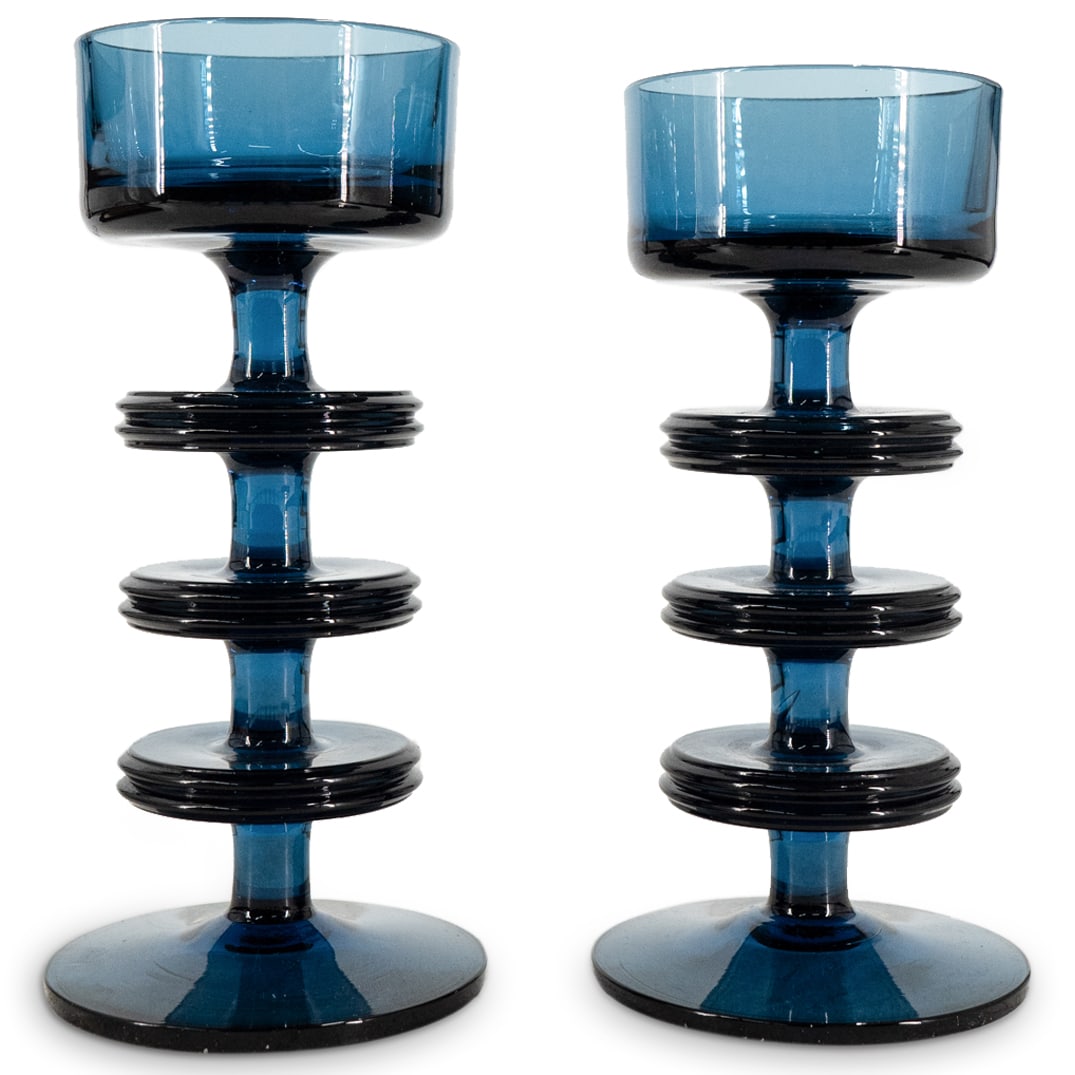 Pair Vintage Wedgwood "Sheringham" Glass Candlesticks: DESCRIPTION: Part of vintage Wedgwood "Sheringham" glass candlesticks, one taller and one shorter, each designed by Ronald Stennett Willson featuring blue coloration. Each marked on underside. CIRCA: 