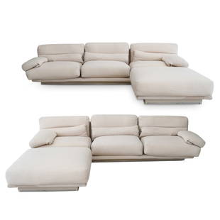 (4Pc) Vintage Saporiti Italia Sofa Set: DESCRIPTION: (4Pc) Vintage Saporiti Italia sofa set features two individual, three-seater sofas and two large ottomans, all with pillow-like cushion and beige upholstery designs, raised on lacquered