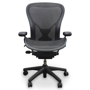 Herman Miller Aeron Office Chair: DESCRIPTION: Herman Miller Aeron office chair with customizable ergonomic design. (Size C) CIRCA: 1999 ORIGIN: USA DIMENSIONS: (Size: C) CONDITION: Pre-owned, slight scuffing and use. Unless