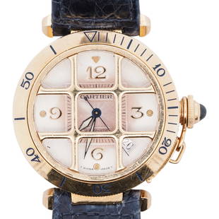 Cartier Pasha 18k Gold Grid Watch: DESCRIPTION: A Cartier Pasa watch REF# W3014356 features an 18k yellow grid gold casing, half skeleton exposed back,automatic movement, guilloche dial, arabic numerals with luminous hands. Incised