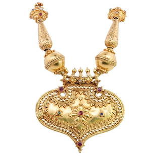 Magnificent Mughal Style 18k Gold and Semi Precious Stone Necklace: DESCRIPTION: A Magnificent Mughal style necklace comprised of a series of repousse and filigree beads excellently accented with a series of Rubies, Emeralds, Amethysts and Diamonds. Supporting a open