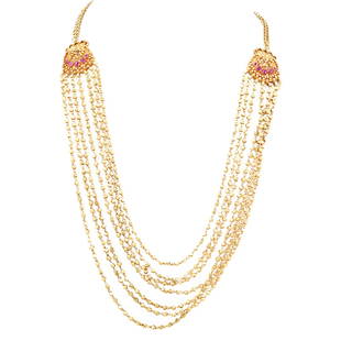 Indian 18k Gold and Multi Stranded Ruby Necklace: DESCRIPTION: An Indian 18k yellow gold necklace comprised of seven beaded gold strands, joined on either side by openwork filigree medallions accented by Ruby cabochons, stamped along the back "18C".