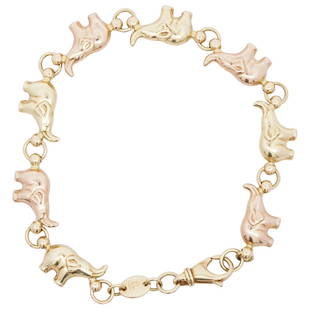 18k Gold Two Tone Elephant Charm Bracelet: DESCRIPTION: A 18k gold bracelet features elephant charms in alternating yellow and rose gold, completed with a lobster clasp. Stamped "750". Total Weight: 9.7 Grams (6.2 dwt) CIRCA: Late 20th Cent. O