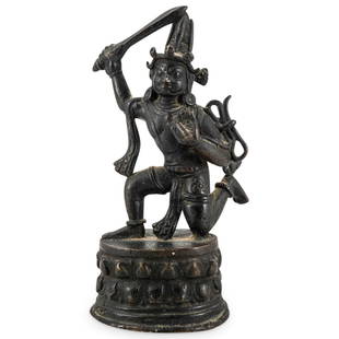 Antique Tibetan Bronze Achala Figure: DESCRIPTION: Antique Tibetan bronze figure of Achala kneeling atop a double lotus base, holding a sword and lasso and wearing a crown with skulls. For a similar figure, see Christie's, The Sporer Coll