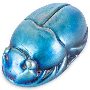 Tiffany Studios Style Favrile Glass Scarab Paperweight.: DESCRIPTION: Tiffany Studios style favrile glass scarab paperweight. CIRCA: 20th Cent. ORIGIN: USA DIMENSIONS: H: 1.75" x D: 5" CONDITION: Great overall condition. Unless otherwise stated, all