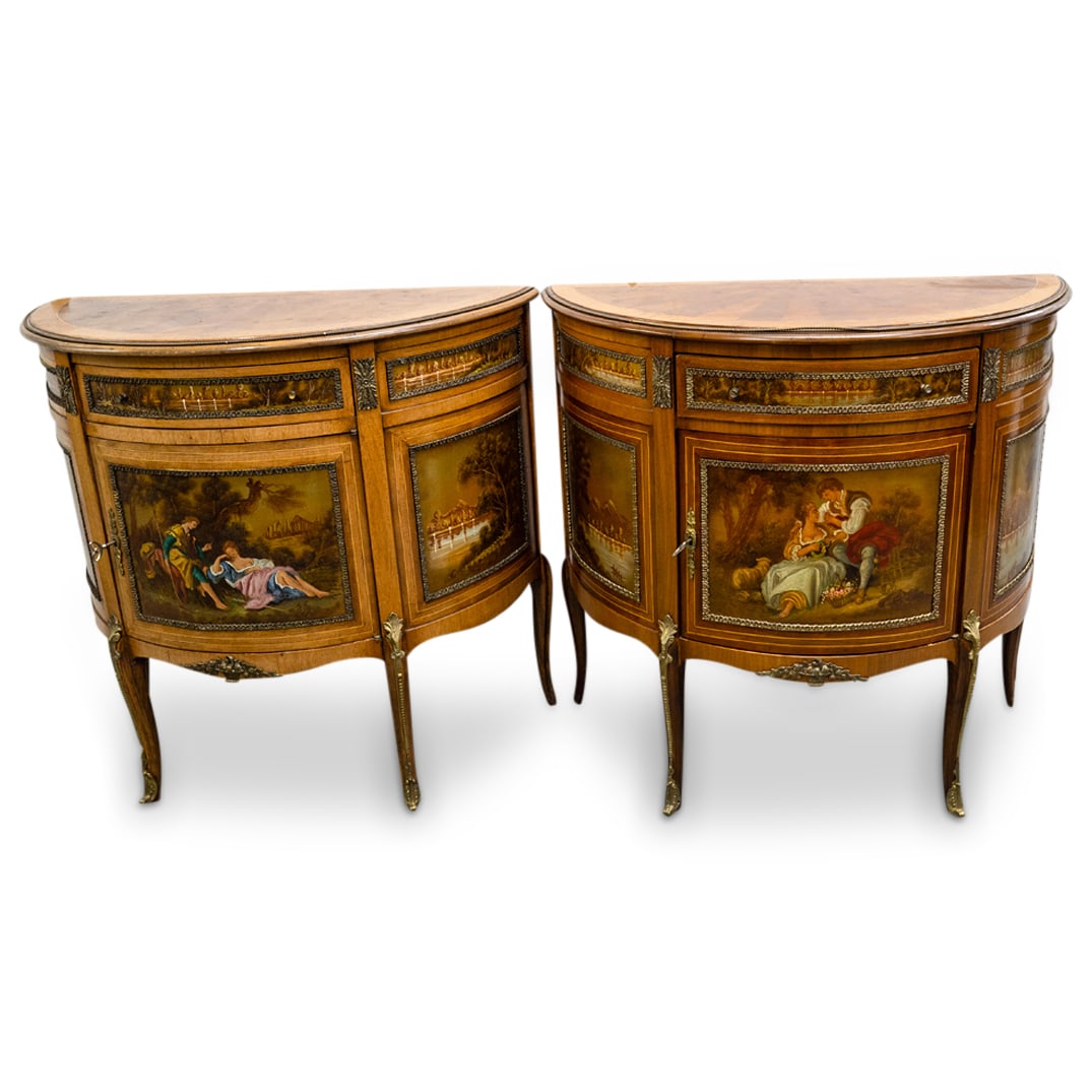 Pair Of Carved Wood Demilune Courting Lovers Cabinets: DESCRIPTION: Two matching carved wood cabinets, each featuring a semi-circular form crafted with parquetry tops and decorated with courting lovers on the main door and accented with idyllic, romantic 