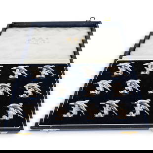 (12 Pc) Vintage 1995 English Sterling Silver Dolphin Place Card Holders: DESCRIPTION: (12 Pc) Vintage 1995 English sterling silver novelty place card holders, by Garrard & Co, London. Each of the models are cast in the form of a dolphin leaping over a wave. This set of twe