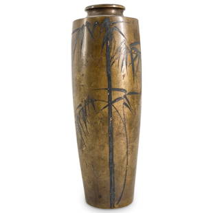 Meiji Period Japanese Bronze & Silver Vase: DESCRIPTION: A Meiji bronze vase decorated with silver inlay depicting bamboo trees, Incised along the underside with Meiji period markings. CIRCA: Late 19th to Early 20th Cent. ORIGIN: Japan