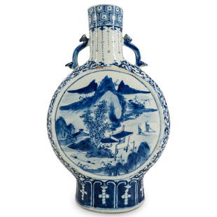 Antique Chinese Blue & White Porcelain Moon Flask: DESCRIPTION: Antique Chinese blue & white porcelain moon flask featuring ruyi handles. floral and foliage motifs and two scenes with buildings, mountains and boats. CIRCA: 19th Century ORIGIN: