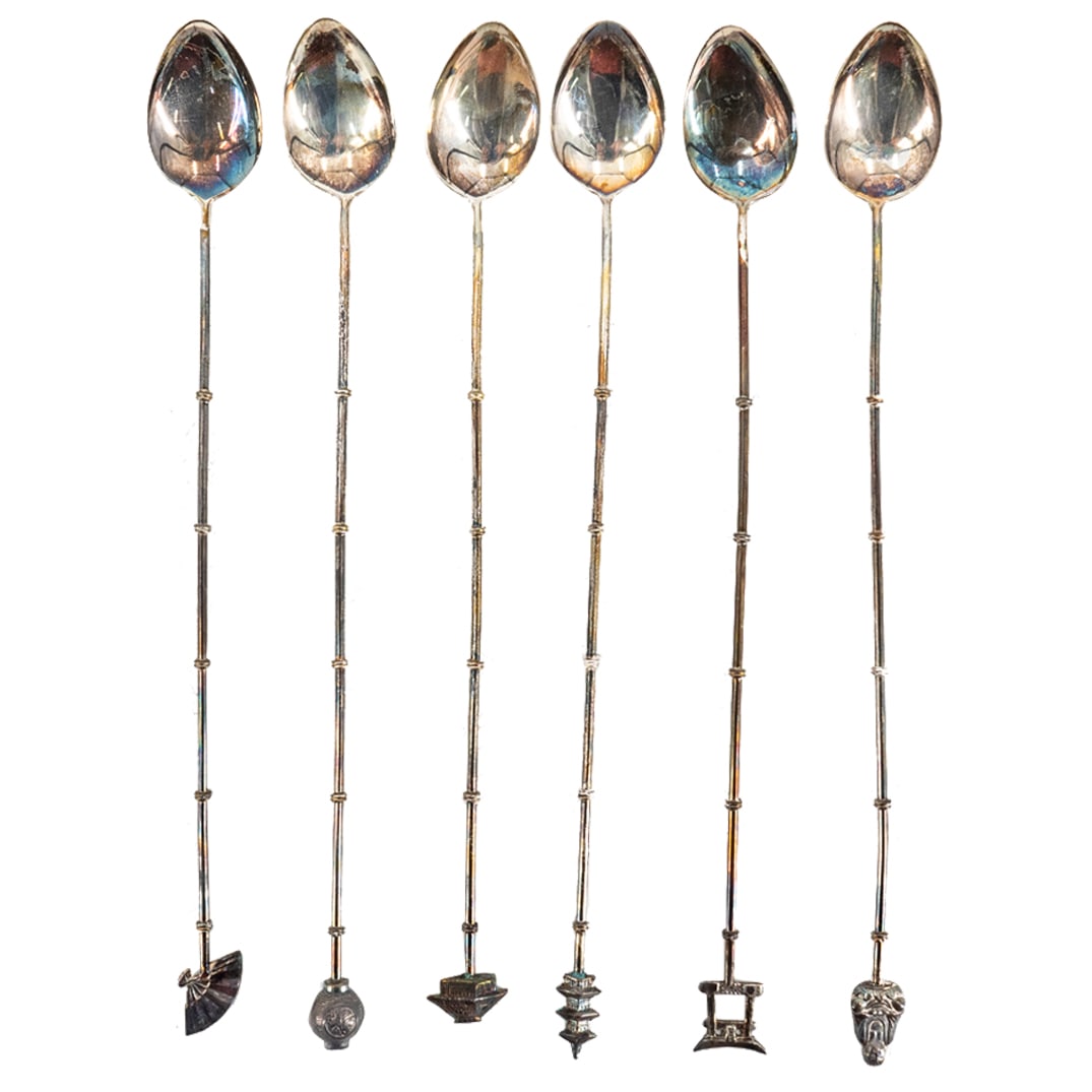 (6Pc) Japanese Sterling Silver Stirrs: DESCRIPTION: (6Pc) Japanese sterling silver stirrs with architectural and cultural finials details. Marked: "Japan Sterling" in faux alligator pattern case. CIRCA: 20th Cent. ORIGIN: Japan DIMENSIONS: