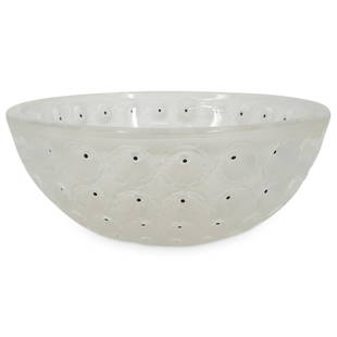 Lalique Crystal "Nemours" Bowl: DESCRIPTION: Lalique crystal "Nemours" bowl featuring a round form and frosted exterior patterned with intaglio flowers. Incised signature at underside: "Lalique, France". CIRCA: 20th Century ORIGIN: