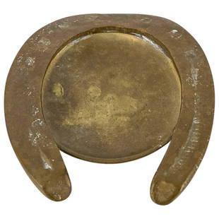 Italian Solid Brass Metal Horseshoe-Shaped Ashtray: DESCRIPTION: Italian solid brass metal horseshoe-shaped ashtray. Marked "Italy" on the underside. CIRCA: 20th Century ORIGIN: Italy DIMENSIONS: W: 6 1/4" D: 5 1/2" CONDITION: Good overall condition wi