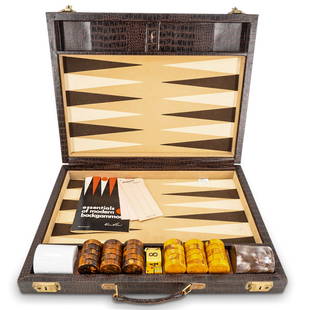 Vintage Crisloid Bakelite Backgammon Set: DESCRIPTION: Vintage Crisloid backgammon set featuring a faux alligator vinyl travel case with bakelite pieces. Includes original manual with score keeping pads, (2) shaker cups, (15pc) brown checkers